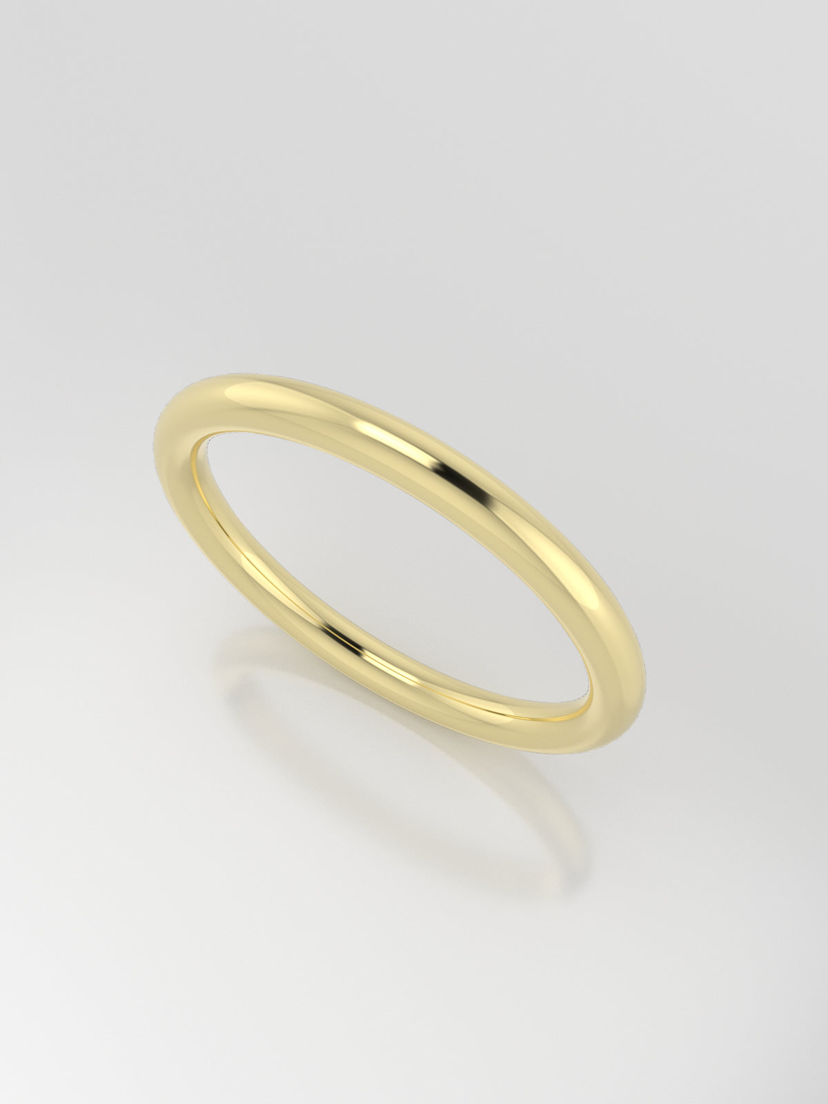 argolla minimalista con forma de cuerpo lisa  y acabado pulido en oro amarillo